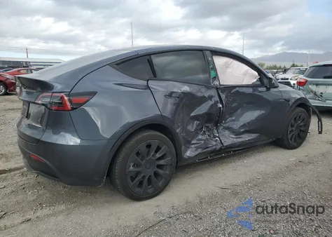 2023 Tesla Model Y из США, поврежденный, VIN 7SAYGDEE4PF618690